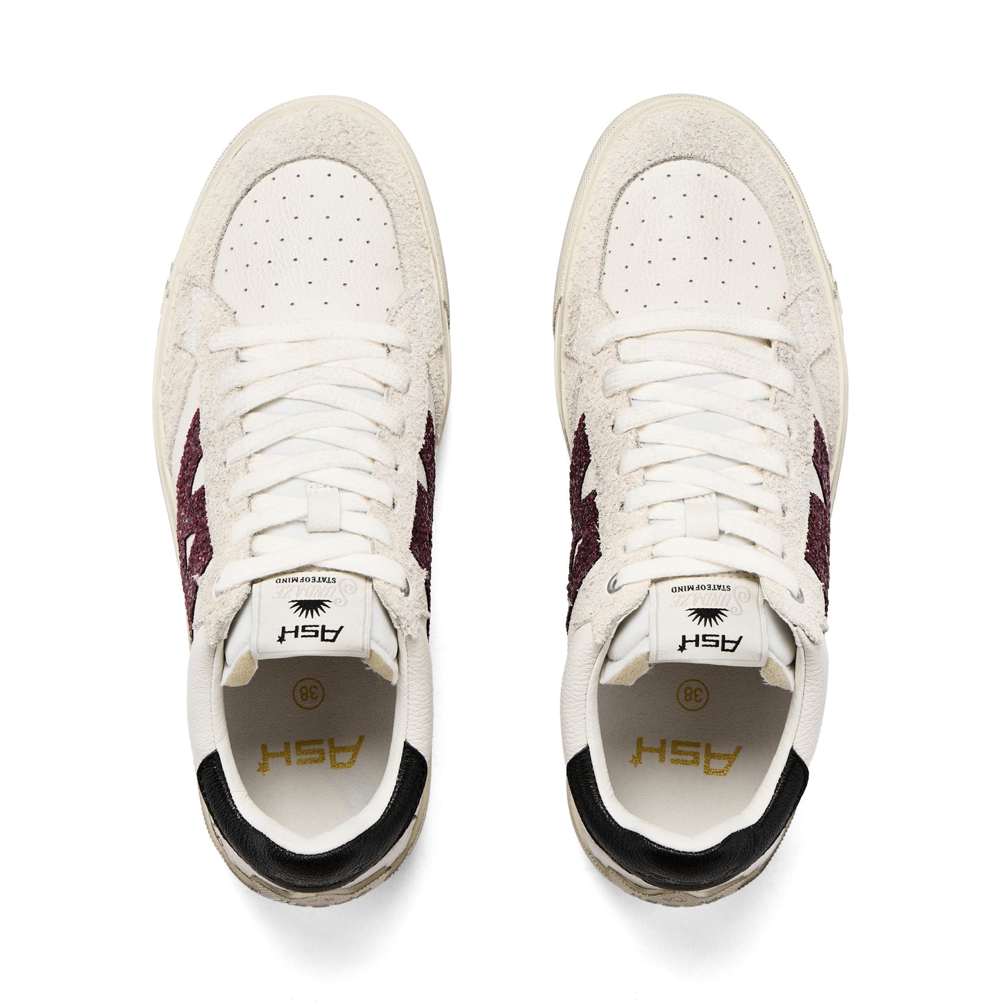 White Sneaker With Purple Detail