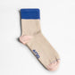 Aydo Studios Altai Route socks in Silent Dune, single sock side view