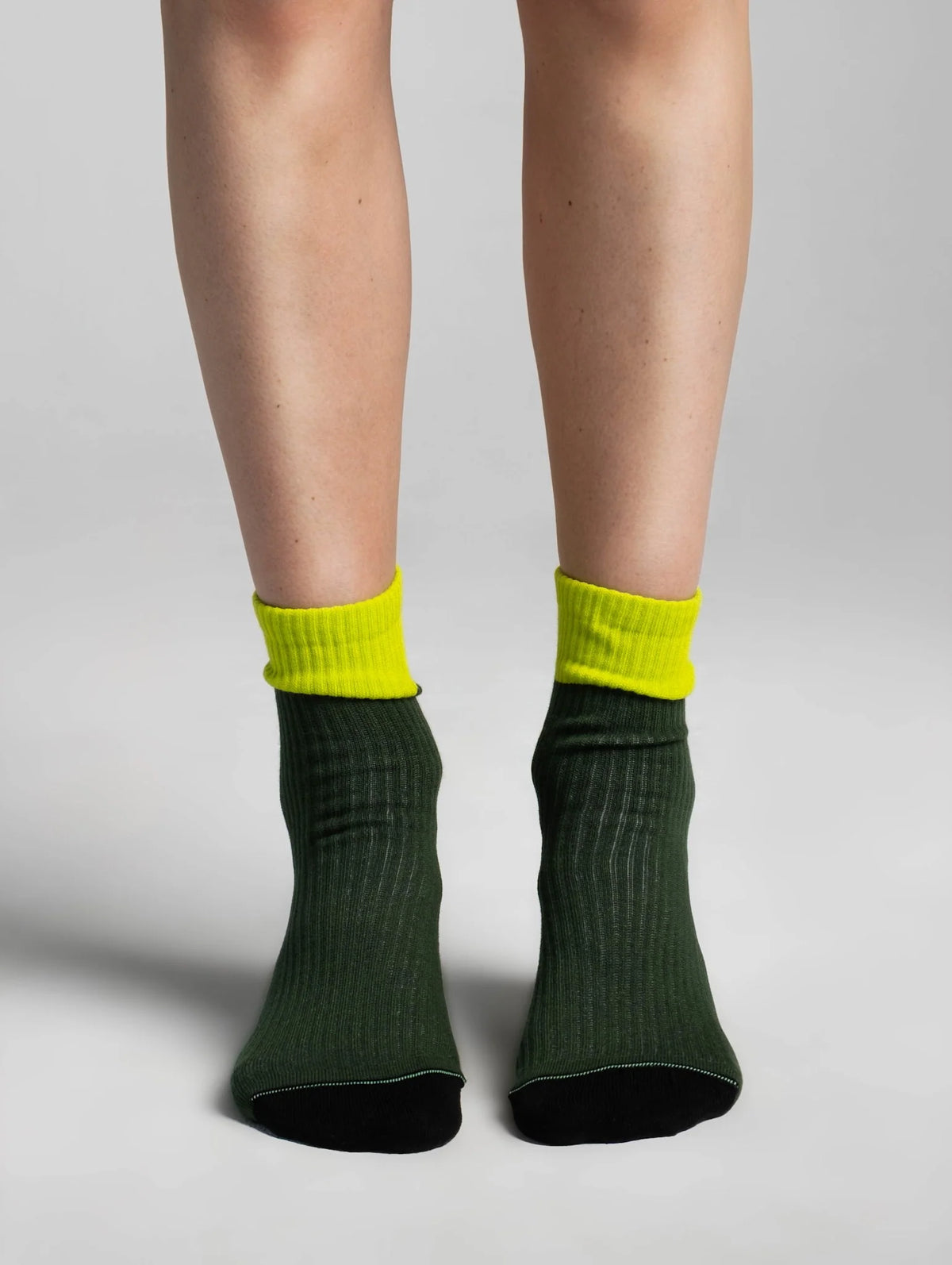 Aydo Studios Altai Route socks in Verdant Pulse, worn front view