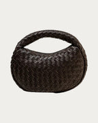 ALEO Laluna Mini Woven Shoulder Bag in Fondant, front view with the woven handle and zip top, on soft stone background