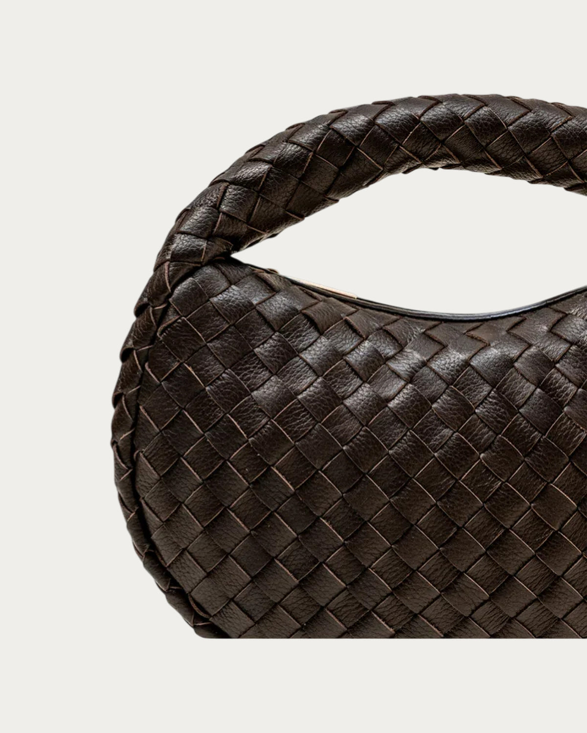 Close-up of the handwoven crossway leather weave and handle on the ALEO Laluna Mini Woven Shoulder Bag in Fondant
