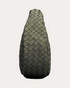 ALEO Laluna Mini Woven Shoulder Bag in Olive, side profile, on soft stone background