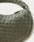 ALEO Laluna Mini Woven Shoulder Bag in Olive, close-up of the handwoven leather and gold zip pull