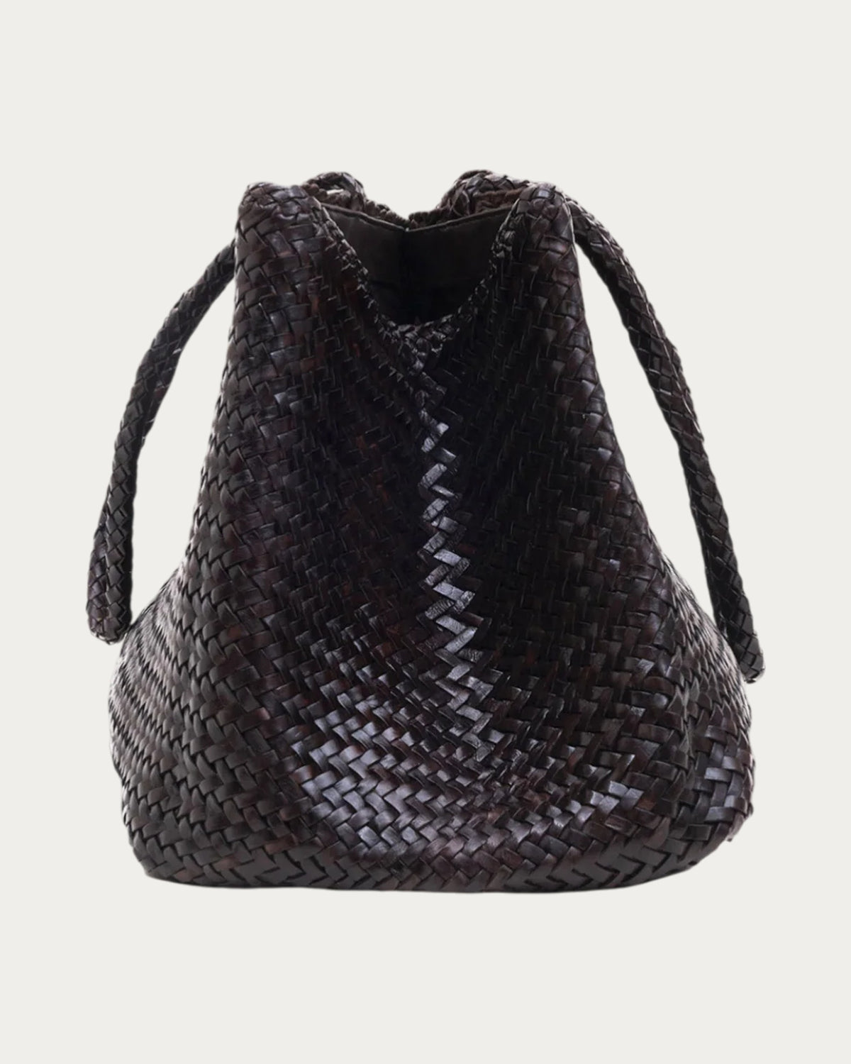 ALEO Romy Woven Tote in Crema, front view with braided handles falling to the sides, on soft stone background