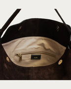 ALEO Shiloh Suede Shoulder Bag in Crema, interior close-up of the cotton lining, zip pocket and ALEO label