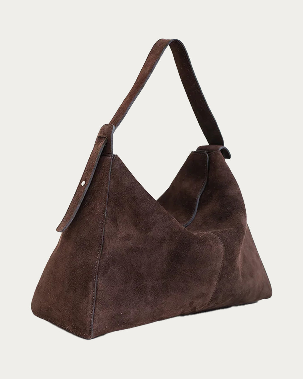 ALEO Shiloh Suede Shoulder Bag in Crema, three-quarter view, on soft stone background