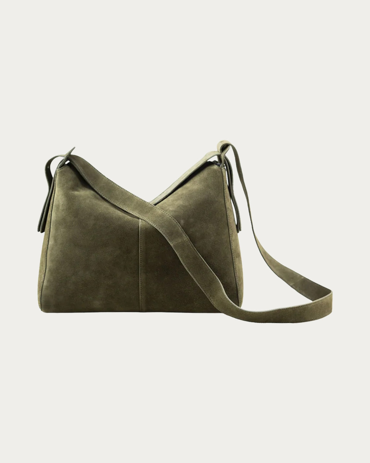 ALEO Shiloh Suede Shoulder Bag in Olive, front view with the long crossbody strap, on soft stone background