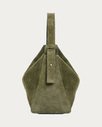 ALEO Shiloh Suede Shoulder Bag in Olive, side view showing the strap, on soft stone background