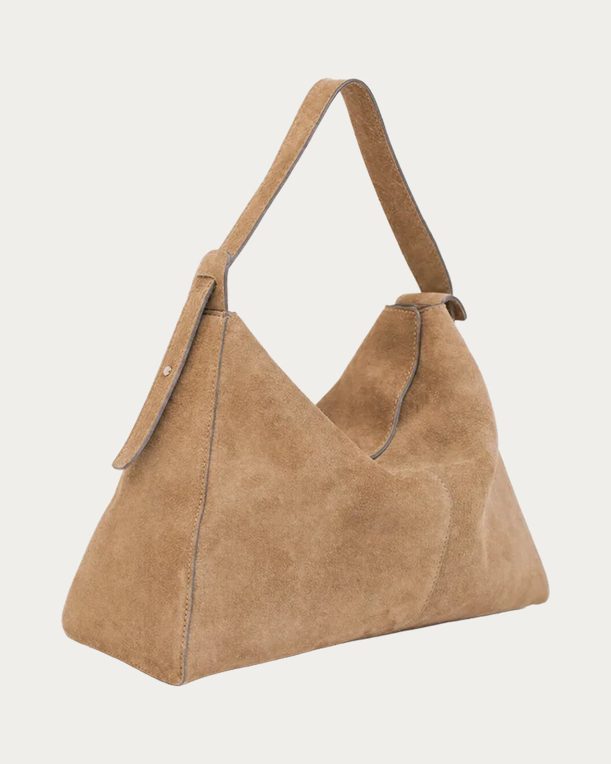 ALEO Shiloh Suede Shoulder Bag in Toffee, three-quarter view with shoulder strap, on soft stone background
