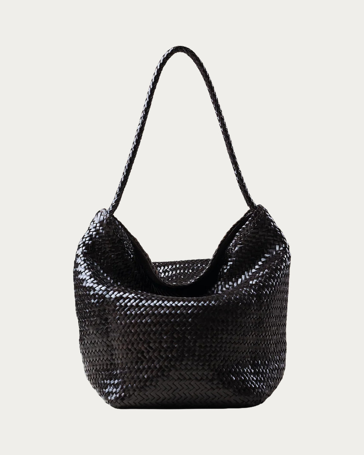 ALEO Toka Woven Tote in Crema, front view with tubular woven shoulder strap, on soft stone background