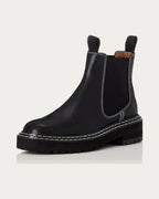 Alias Mae Rome black leather ankle boot, angled front view with pull tabs and lugged sole