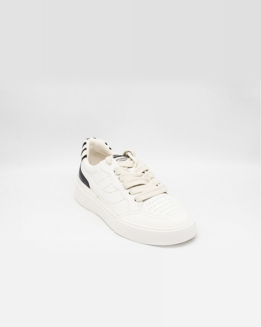 Ash Free white platform sneaker with chunky cream laces, angled front view