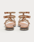 Amari Shoes & Fashion Cork cinnamon gladiator sandals with gold studded straps and buckle closures, back view