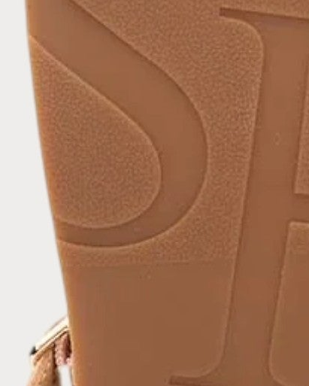 Ash Gladiator studded sandal in Luxor gold - sole logo detail