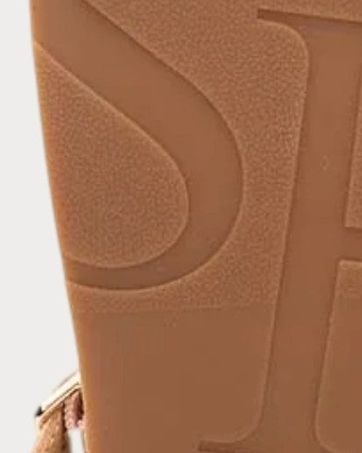 Ash Gladiator studded sandal in Luxor gold - sole logo detail