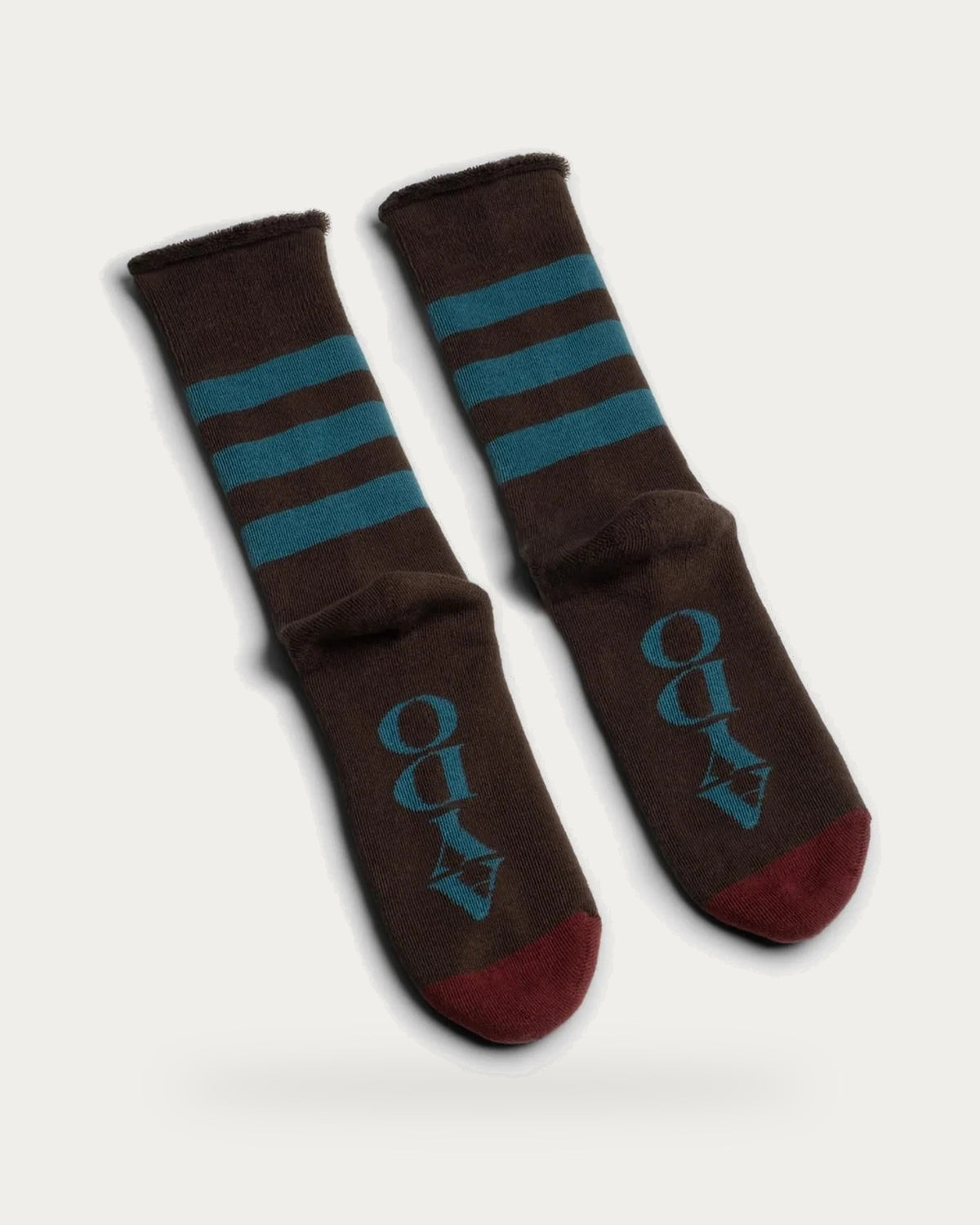 Aydo Studios Baltic Core Sacred Soil Socks – pair of socks on soft stone background