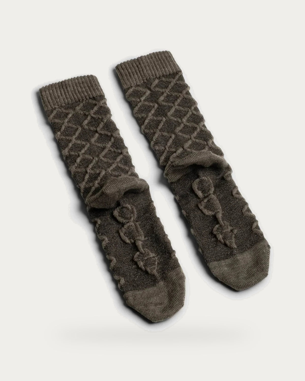 Aydo Studios Barasov Crossover Silent Matter Socks – pair of socks on soft stone background
