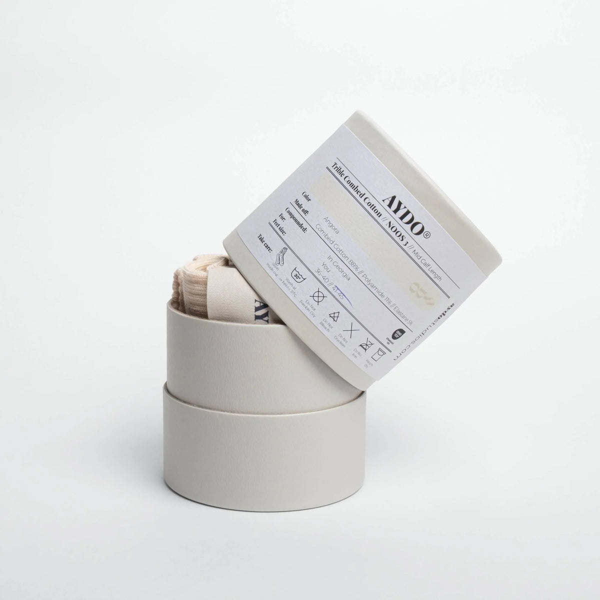 Aydo Studios Copenhagen socks in Angora, signature tube packaging