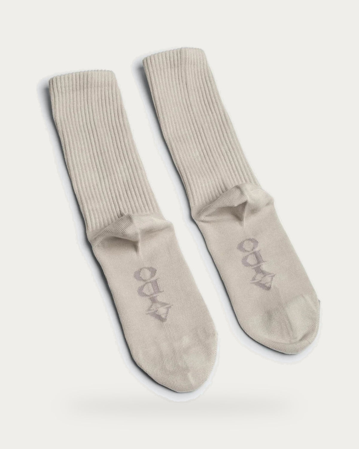 Aydo Studios Copenhagen Pigeon Socks – pair of socks on soft stone background