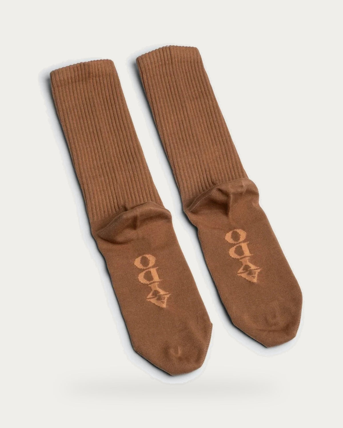 Aydo Studios Copenhagen Tigers Eye Socks – pair of socks on soft stone background