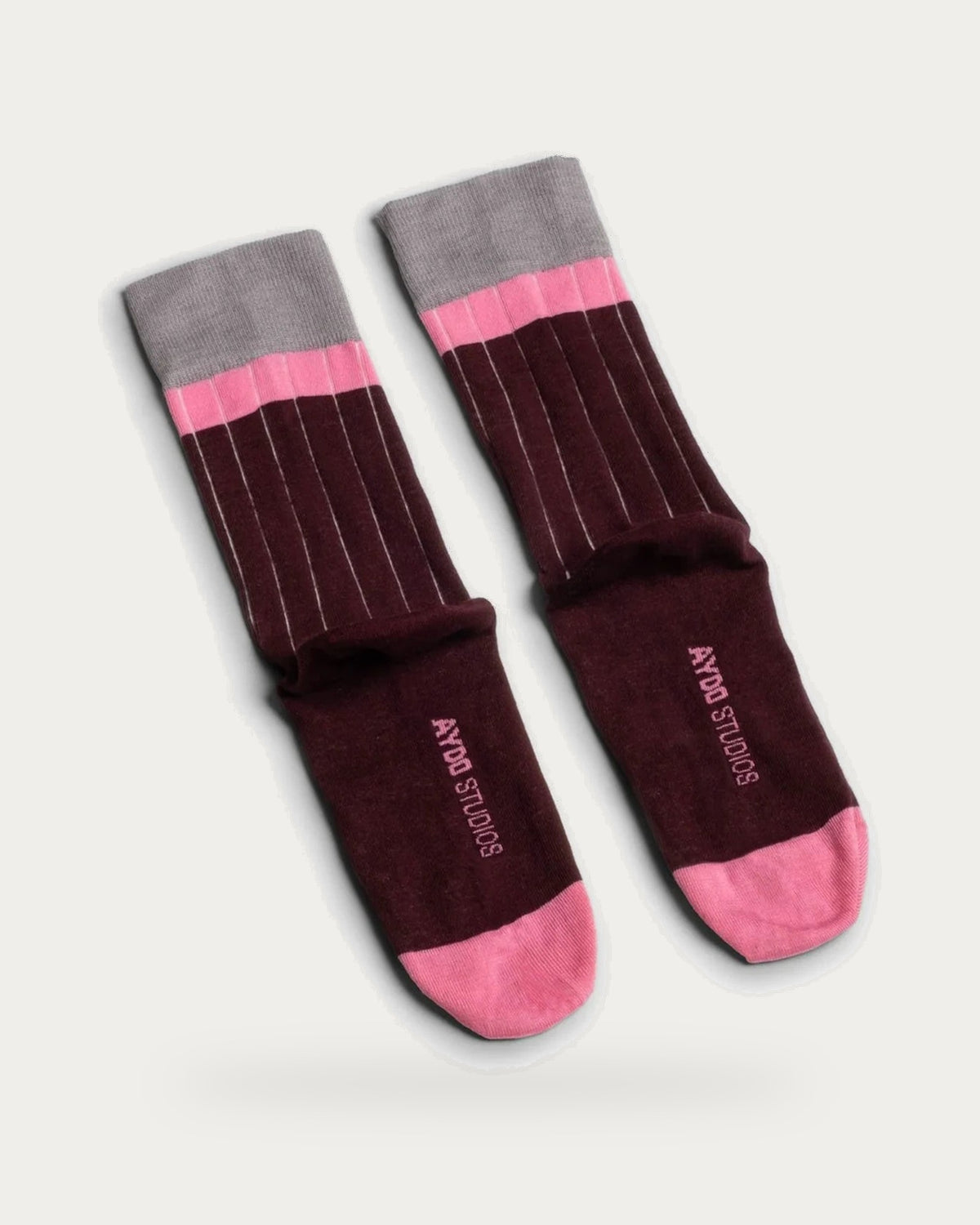 Aydo Studios Varna Flow Muted Nectar Socks – pair of socks on soft stone background