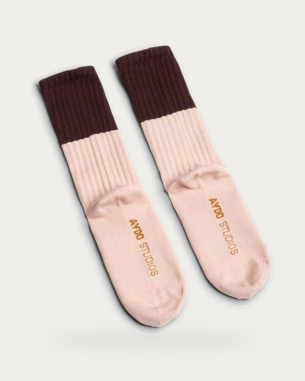 Aydo Studios Veliko Pass Faded Blush Socks – pair of socks on soft stone background