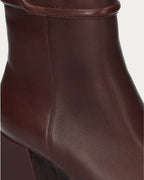 Close-up of the burgundy leather and ankle strap on the Bibi Lou block heel ankle boot