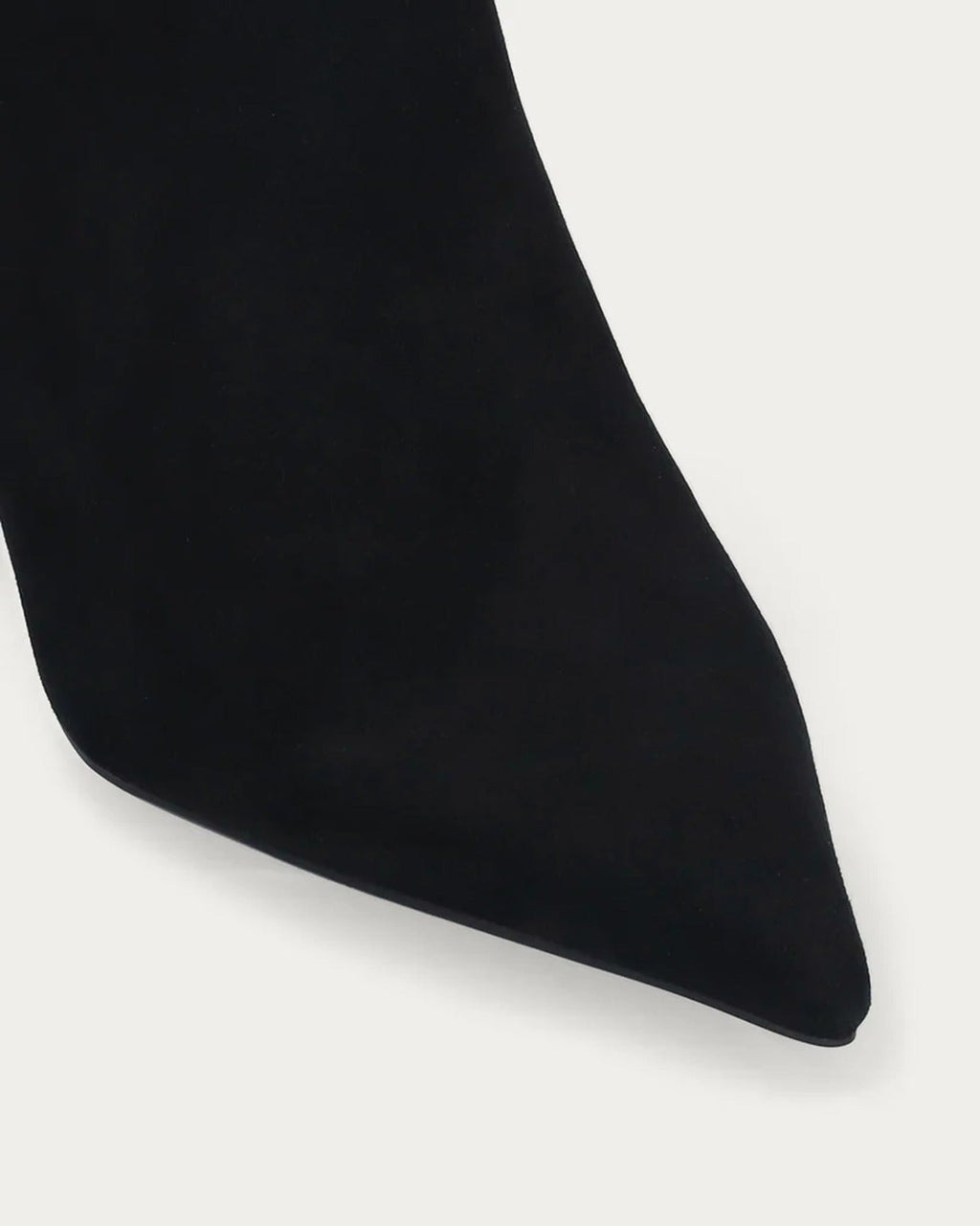 Close-up of the pointed toe on the Bibi Lou Saint Ankle Boot In Black Suede