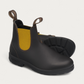 Pair of Blundstone 1919 Brown with Mustard Chelsea Boots showing the outsole tread