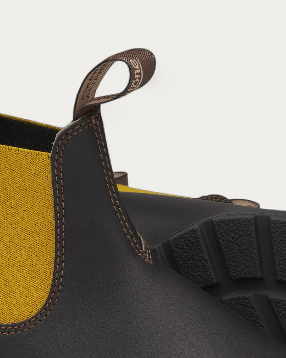 Blundstone 1919 Chelsea Boot pull tab detail with Tasmania Australia branding and mustard elastic