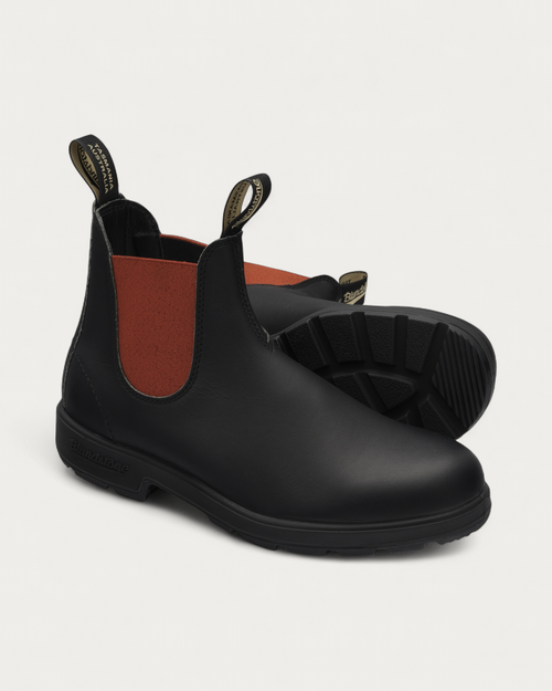 Pair of Blundstone 508 Black with Red Chelsea Boots showing the TPU outsole tread