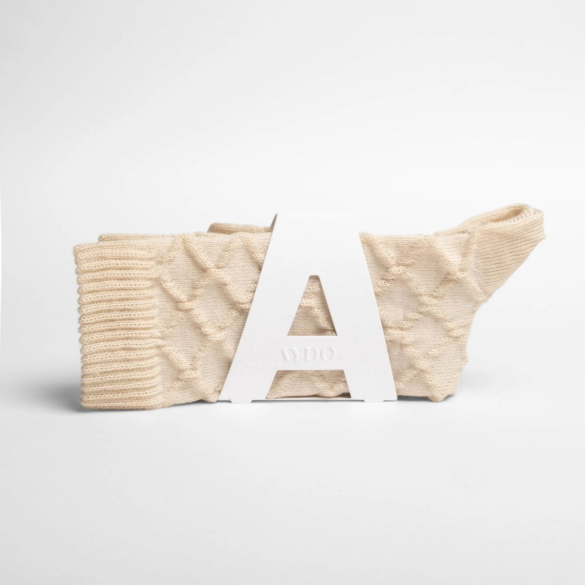 Aydo Studios Barasov Crossover socks in Folded Light, styled shot