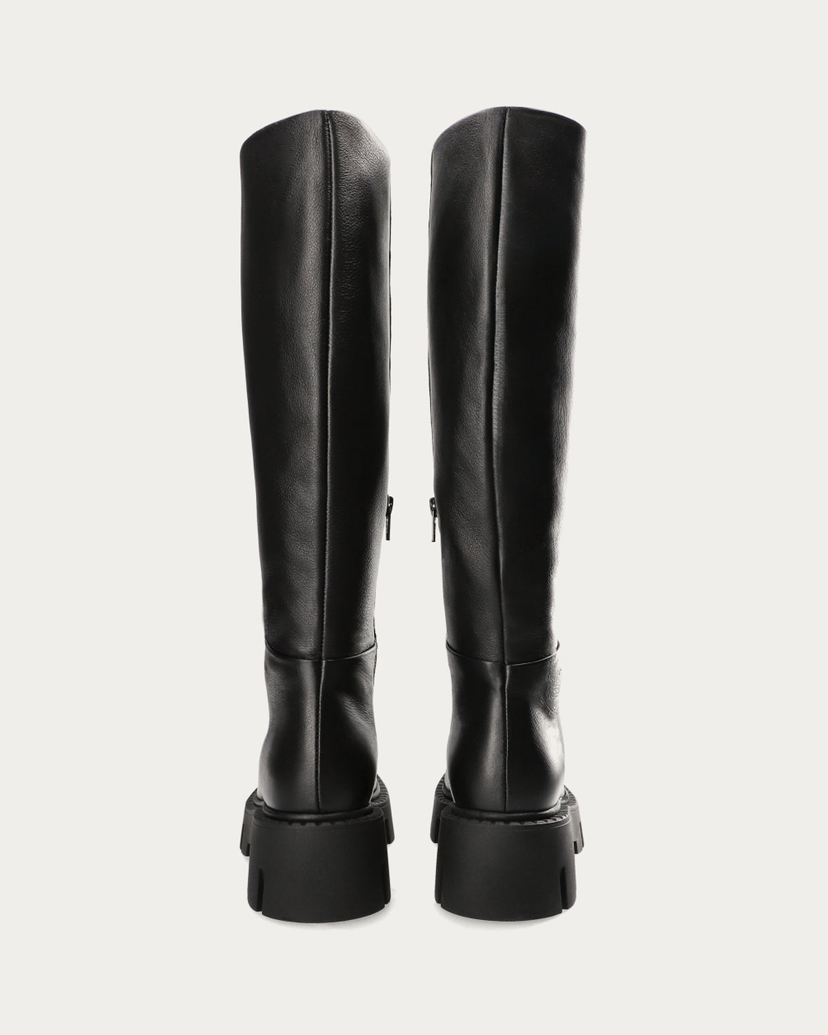 Pair of Copenhagen Studios black knee high leather chunky boots, back view
