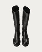 Top view of a pair of Copenhagen Studios black knee high leather chunky boots