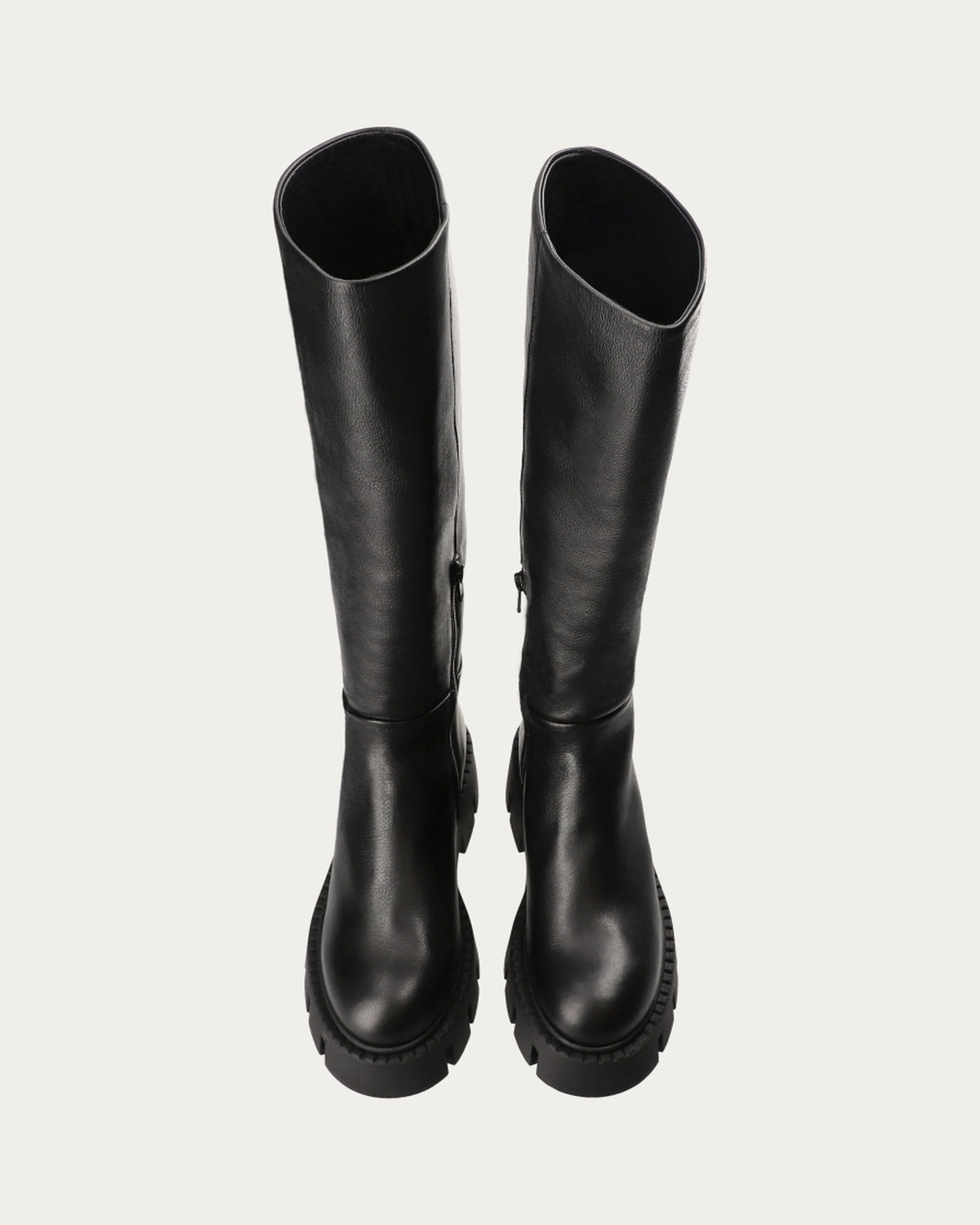 Top view of a pair of Copenhagen Studios black knee high leather chunky boots
