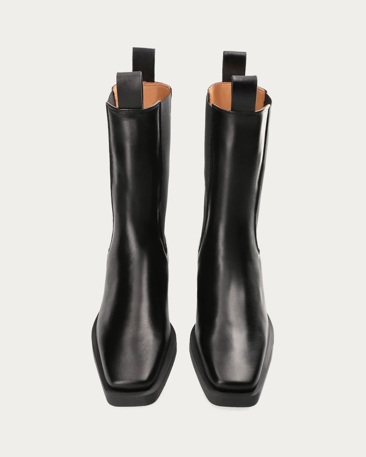 Pair of Copenhagen Studios black leather high Chelsea boots with square toe, front view