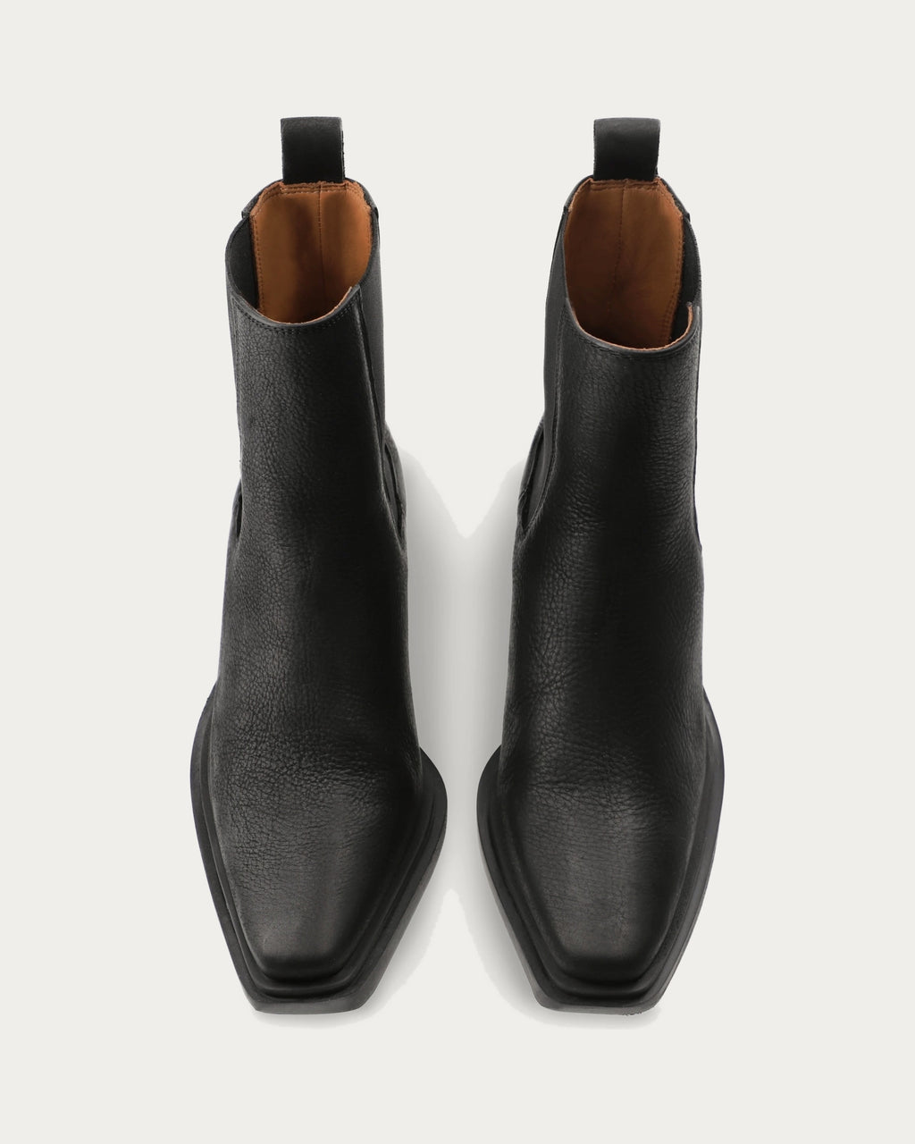 Pair of Copenhagen Studios black nubuck Chelsea boots with square toes and pull tabs, top view
