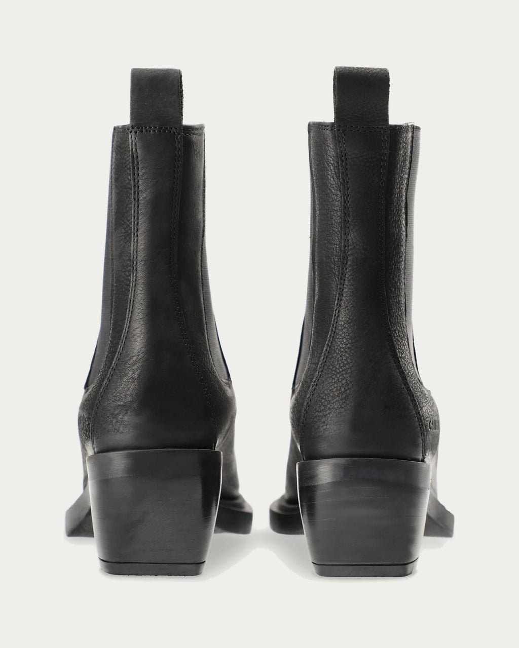 Pair of Copenhagen Studios black nubuck Chelsea boots with angled block heels, back view