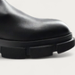 Round toe and lug sole of the Copenhagen Studios CPH500 black leather boot