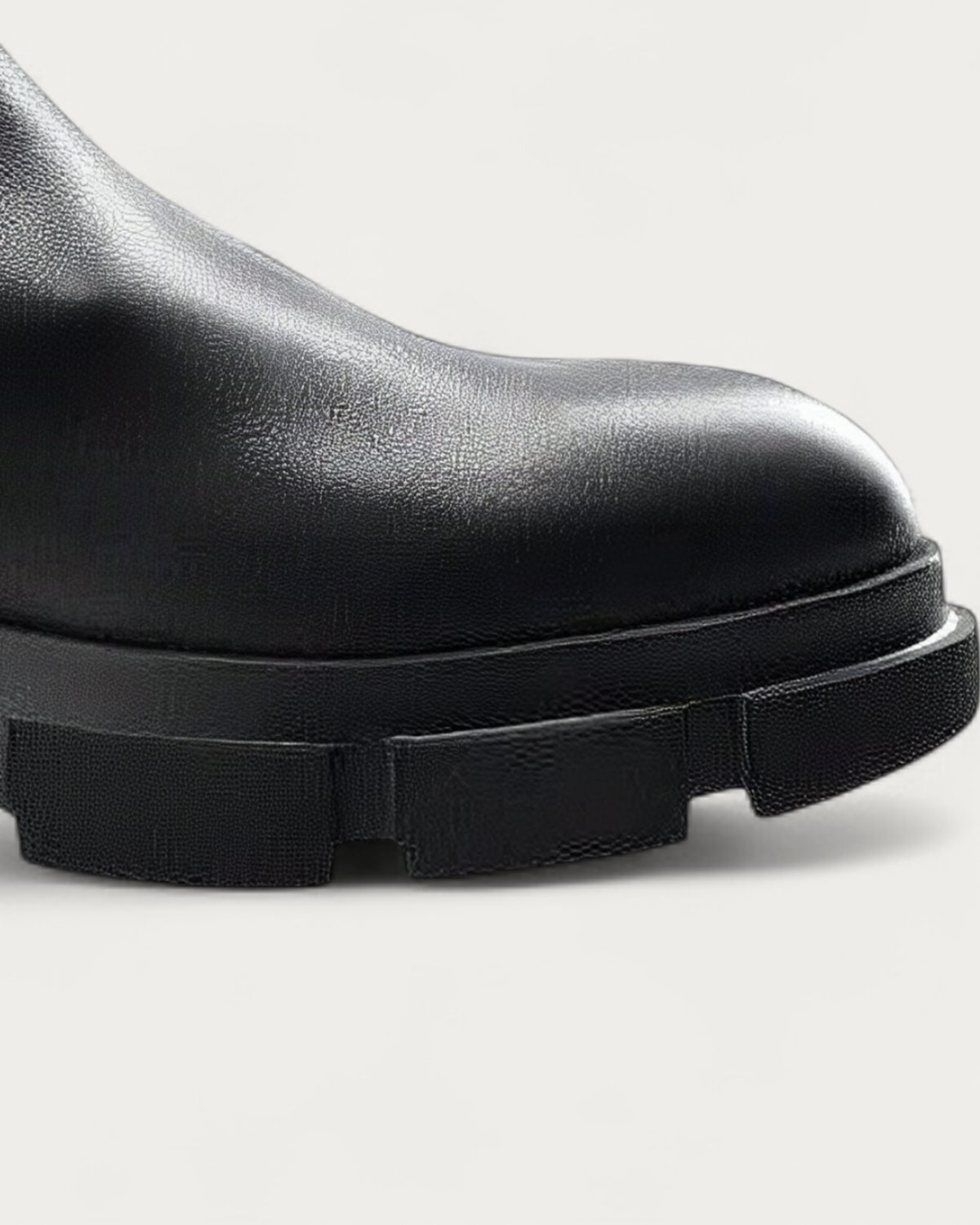 Round toe and lug sole of the Copenhagen Studios CPH500 black leather boot