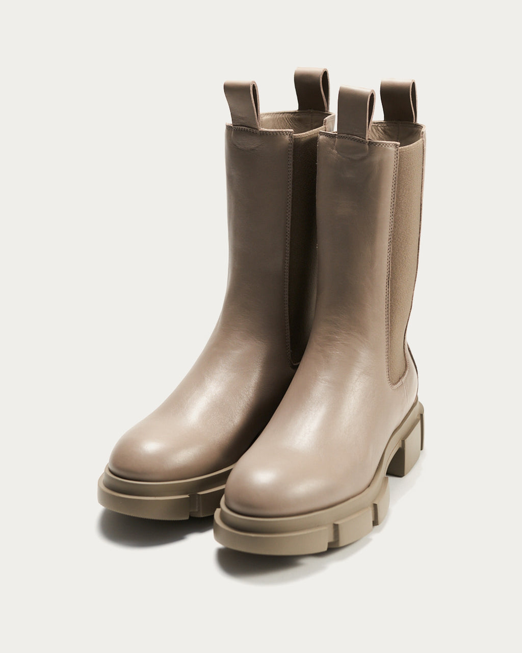 Pair of Copenhagen Studios fango leather Chelsea boots, front angled view with rounded toe and chunky sole