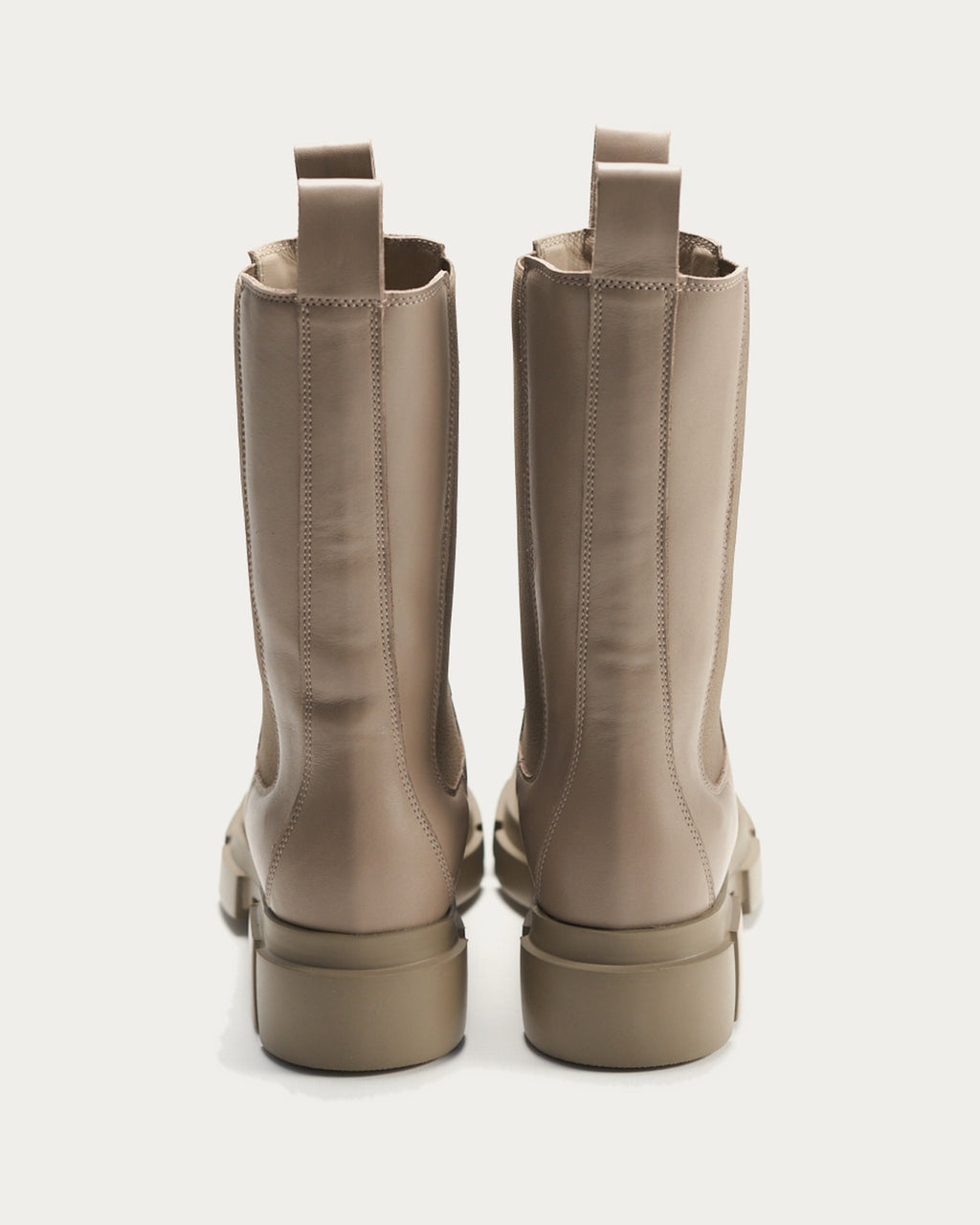 Pair of Copenhagen Studios fango leather Chelsea boots, back view with block heel