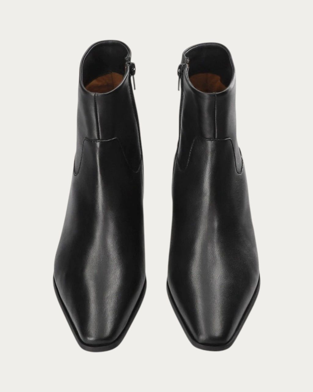 Copenhagen Studios black leather ankle boots with side zip, top-down pair view