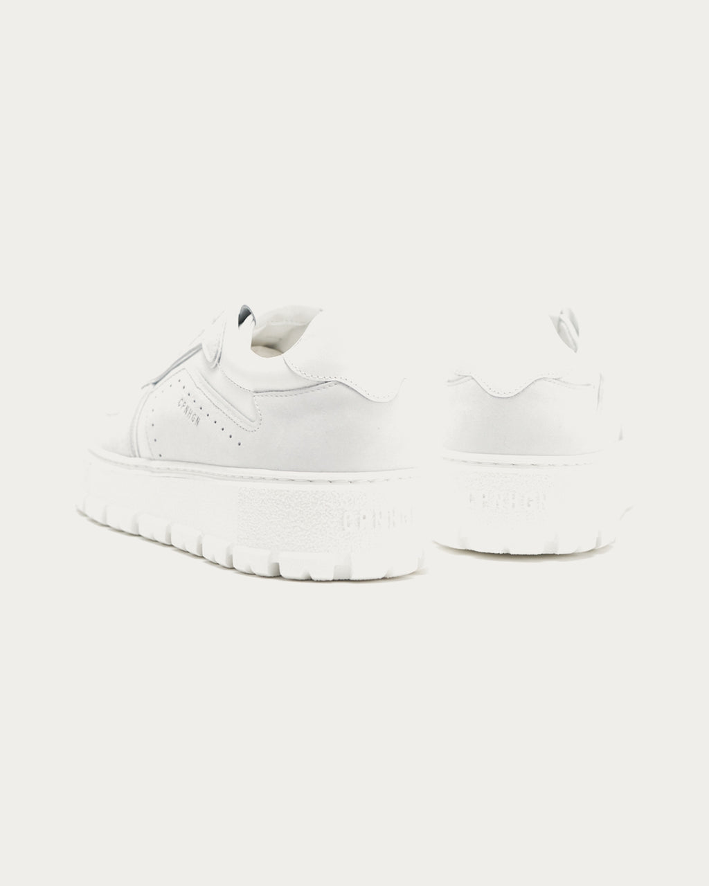Pair of Copenhagen Studios white platform sneakers, rear three-quarter view