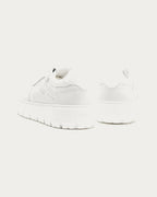 Pair of Copenhagen Studios white platform sneakers, rear three-quarter view