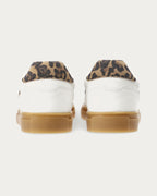 Pair of Copenhagen Studios white leather sneakers with padded leopard heel tabs, back view