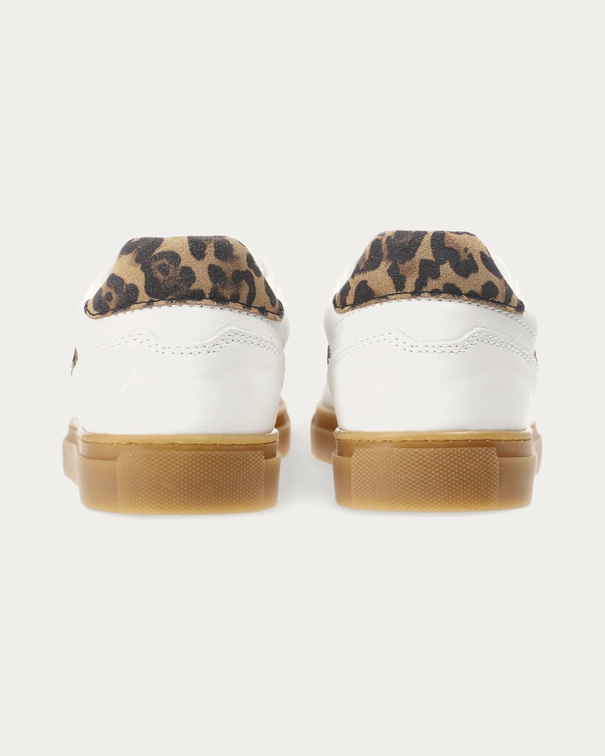 Pair of Copenhagen Studios white leather sneakers with padded leopard heel tabs, back view