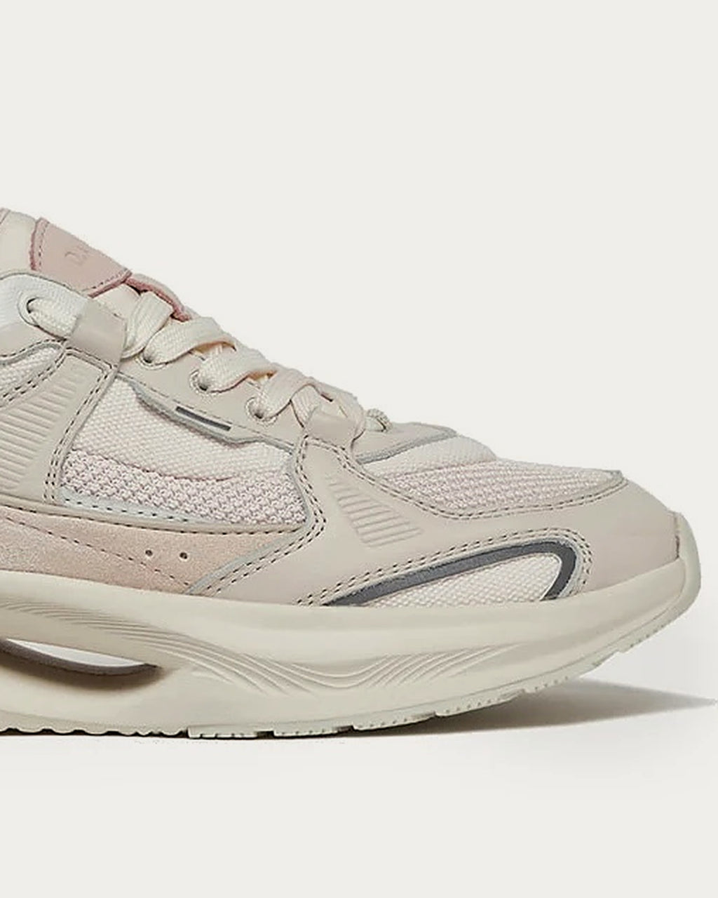 Close-up of the D.A.T.E. Vela Hybrid pink sneaker showing cotton laces, suede panel and sculpted midsole
