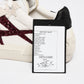 White Sneaker With Purple Detail
