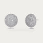 Edblad Bead Sparkle Stud Earrings In Steel, a pair of round steel stud earrings covered in clear sparkling stones, product photo on a soft off-white background